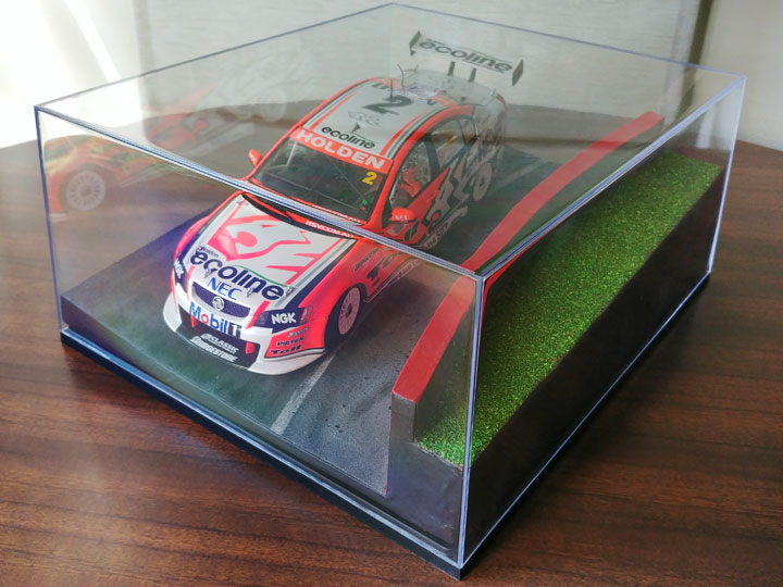 V8 Supercar diorama inside a display case