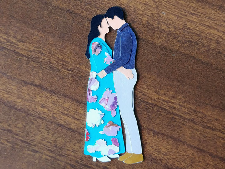 Paper art of a couple on their wedding day