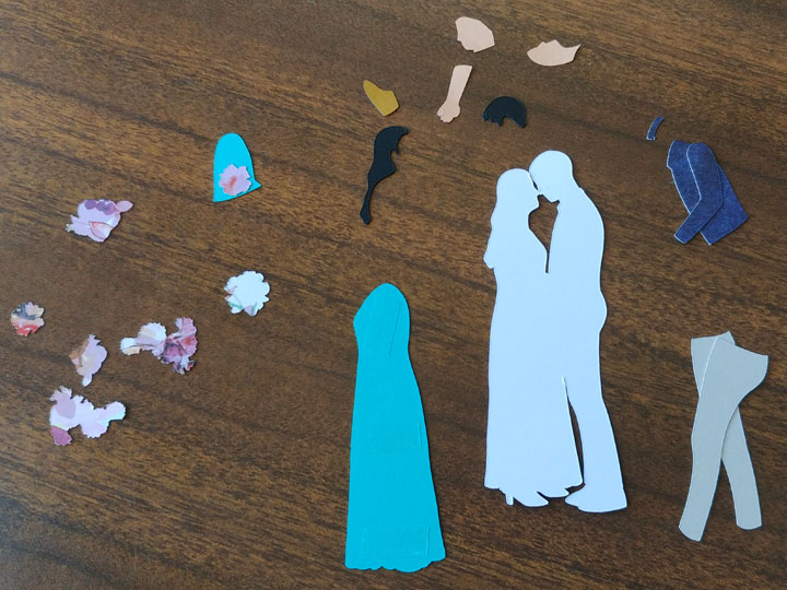 Pieces of coloured paper cut to shape